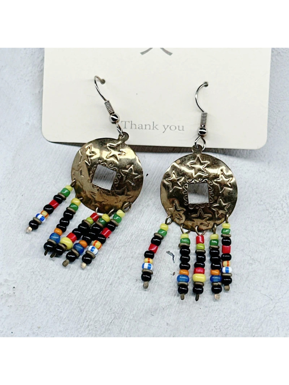 824mc. Goldtone Star Whimsigoth Earrings